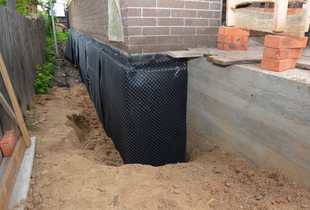 Happy homeowners after waterproofing job in Joelton